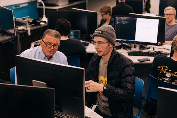 Students working with Computer Science professors