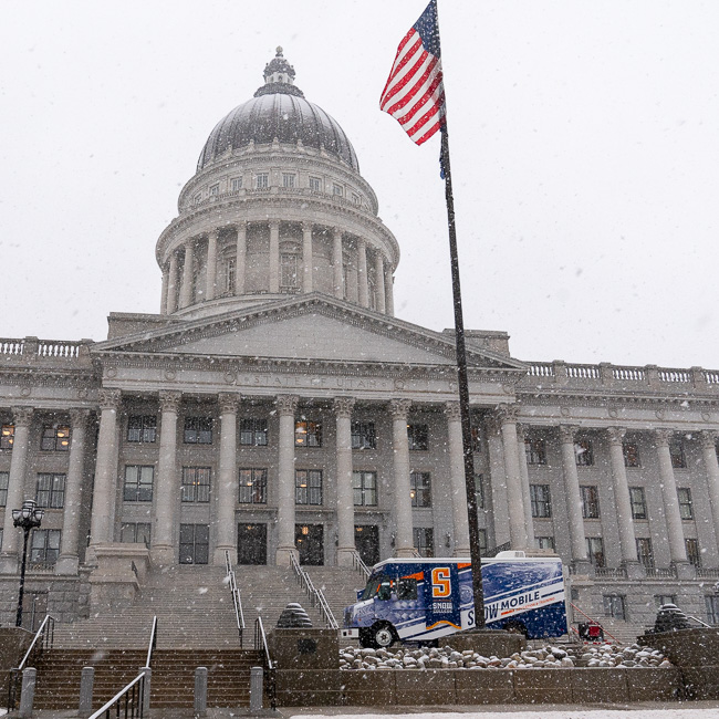 The Snow Mobile sites below the capitol during Snow Day on the Hill